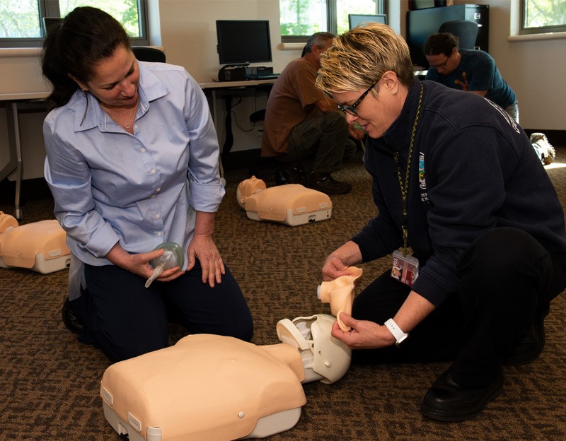 Port of Portland Deputy Fire Marshal Lani Hill leads a CPR course for Port employees